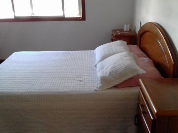 CASA EM CIMA DA LOJA